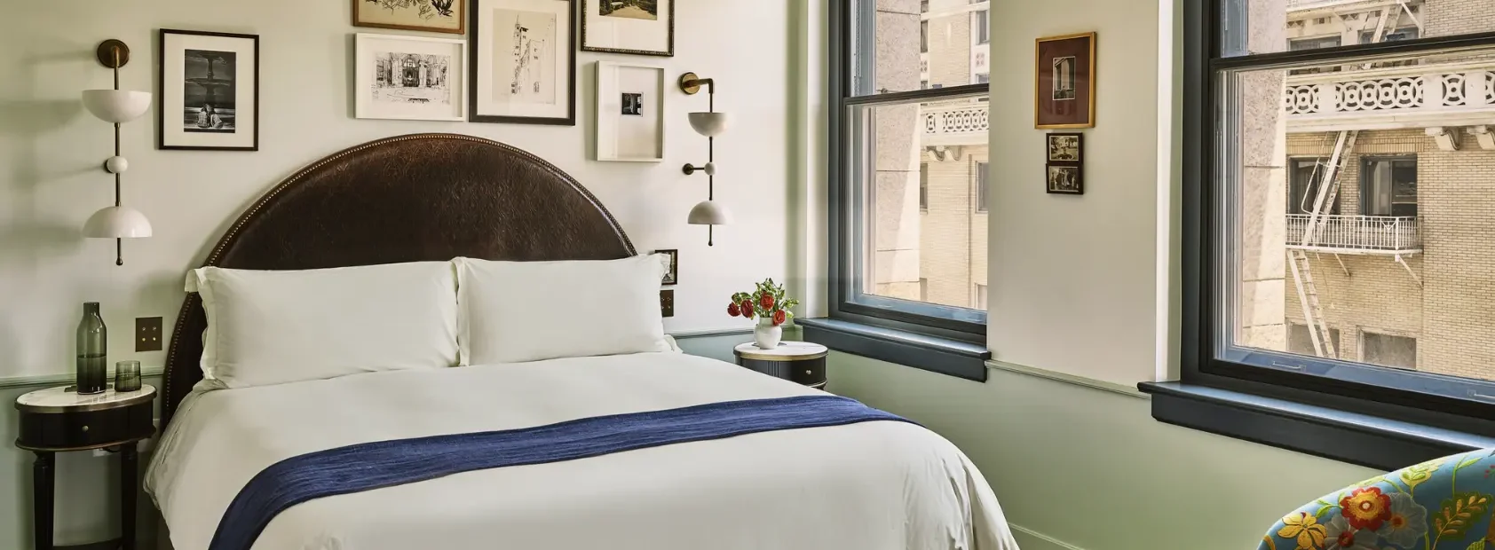 City view study bedroom, bed with side table and couch