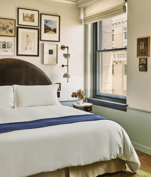 City view study bedroom, bed with side table and couch