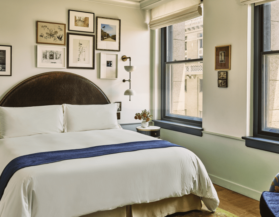 City view study bedroom, bed with side table and couch