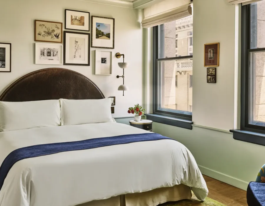 City view study bedroom, bed with side table and couch