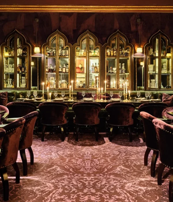 Velvet chairs and candlelight set an opulent mood at one of the top Italian restaurants in Los Angeles.