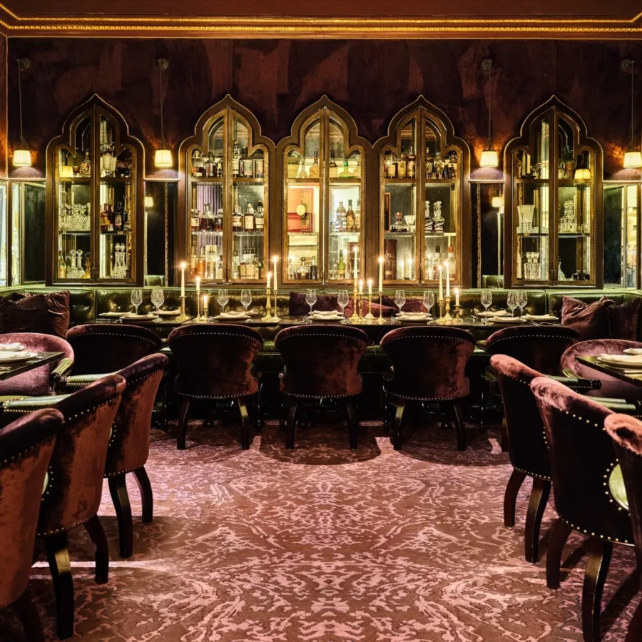 Velvet chairs and candlelight set an opulent mood at one of the top Italian restaurants in Los Angeles.