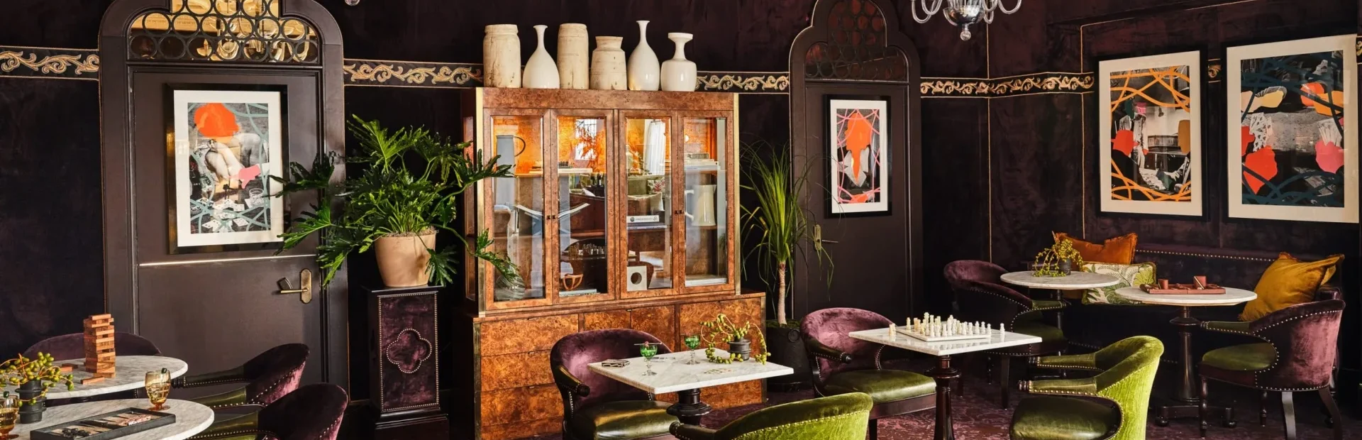 Plush velvet seating and marble game tables offer a sophisticated escape at this boutique hotel in Los Angeles.