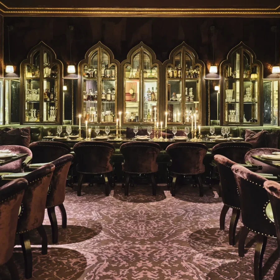 Plush velvet chairs and candlelight create an intimate setting at Ristorante Per L'Ora in Downtown Los Angeles.