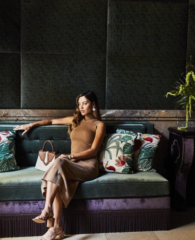 Lobby Entryway with woman sitting on sofa