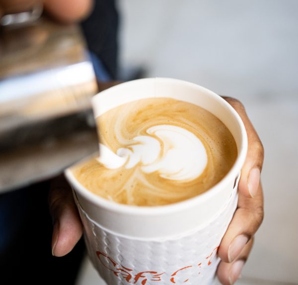 Making a latte with foamed milk