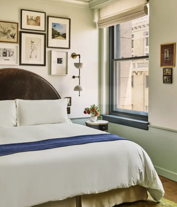 City view study bedroom, bed with side table and couch