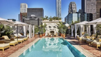 Rooftop pool at Hotel Per La with downtown LA views